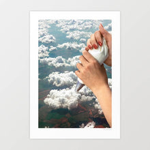 Load image into Gallery viewer, Piping Clouds” surreal art print depicting a piping bag extruding fluffy white clouds into a pale blue sky. The whimsical cloudscape design blends dreamy minimalism with surreal imagery, making it perfect for modern home décor, office walls, and gallery spaces. Ideal for lovers of sky art, atmospheric posters, and surreal wall decor that adds a soft, imaginative touch to living rooms, studios, or bedrooms.