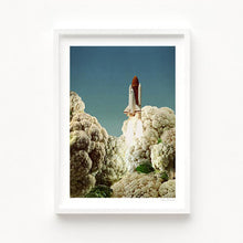 Load image into Gallery viewer, Surrealism takes flight in “Houston We Have Cauliflower,” where a NASA space shuttle launches from a field of cauliflower clouds. This imaginative artwork is ideal for wall art buyers searching for kitchen posters, vegan decor, astronaut-themed interiors, or unique home design ideas. Great for science lovers, space enthusiasts, or those who enjoy witty, surreal collage art. A bold piece for cafes, dining rooms, boys bedrooms, or quirky gallery wall collections.