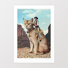 Load image into Gallery viewer, Cat Lone Ranger artwork featuring a cowboy riding a giant cat through a desert landscape, perfect for quirky and unique home decor, rodeo art and western desert interior design adds a playful touch to any room. Enhance your home decor with this imaginative and humorous print. Shop now for quirky wall art.