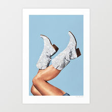 Load image into Gallery viewer, Illuminate your space with 'These Boots - Glitter Blue,' a striking digital artwork featuring glittery blue cowgirl boots set against a vibrant, energetic backdrop. This piece is perfect for adding a touch of glam and western charm to any decor, seamlessly blending boho-chic and modern styles. Ideal for home, office, or studio spaces, this artwork brings a bold, stylish vibe and a splash of color.