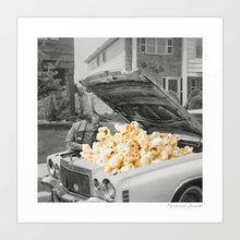 Load image into Gallery viewer, Pop the Hood is a surreal retro artwork where a mechanic checks the hood of a vintage 1960s car only to find it overflowing with popcorn. A witty mix of black and white photography and playful color, this print is ideal wall art for movie lovers, mechanics, man caves, or anyone who loves quirky retro posters. Perfect for movie night decor, date nights, or home theaters, this kitsch art print is also a great gift for him, popcorn lovers, or car enthusiasts.