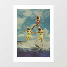 Load image into Gallery viewer, Experience the surreal spectacle of "On Evil Beach" as three women glide in perfect formation, water skiing amidst the radiant sunshine of Florida's shores. Their infectious laughter resonates against the backdrop of azure waters and golden sands, but a chilling twist awaits— their heads transformed into fearsome shark visages.This captivating artwork challenges perceptions, exploring the fusion of thrill and danger.