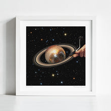 Load image into Gallery viewer, Surreal cosmic artwork print titled “Galactic DJ II” showing a disco ball planet Saturn being played like a vinyl record on a DJ turntable stylus, set against a galaxy full of glowing stars. This trippy disco-inspired poster is perfect for those searching for space wall art, surrealist collages, or retro wall decor with music culture vibes. A must-have wall print for DJs, record collectors, and home bars looking for unique art prints with cosmic groove energy.