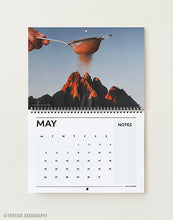 Load image into Gallery viewer, May page of the 2027 collage art calendar, hand sifting cocoa powder over a red mountain peak, surreal kitchen wall art