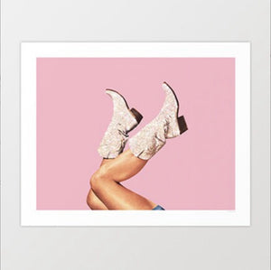 Add a touch of glamour with 'These Boots - Glitter Pink.' This stunning artwork features glittery pink cowgirl boots set against a vibrant backdrop, perfect for boho-chic and glam decor. Ideal for home, office, sorority, dorm room or studio spaces. Shop now for a bold, stylish addition to your collection