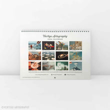 Load image into Gallery viewer, Premium 2026 art calendar showcasing original surreal collage artwork, perfect for modern interiors and creative home decor.