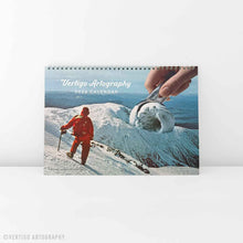 Load image into Gallery viewer, A4 2026 wall calendar featuring surreal collage art, with twelve unique monthly designs inspired by seasonal colour and atmosphere.