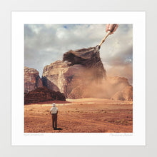 Charger l'image dans la galerie, Giant feather duster cleaning sandy desert landscape with mountains - surreal nature intervention wall art print
