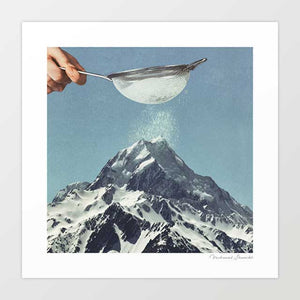 Adding the final baking flourish of icing sugar to the mountain top of Aoraki, Mount Cook New Zealand.